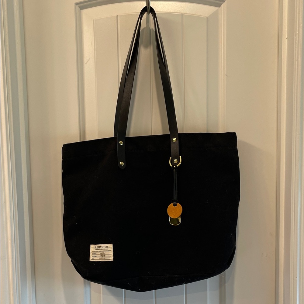 Stylish Black Tote Bag with Gold Accents